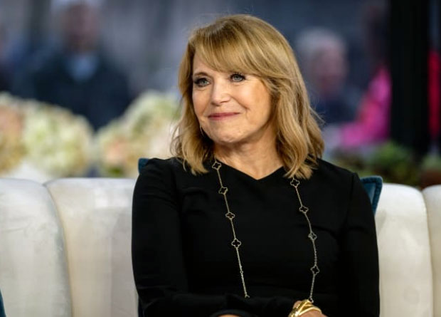 Katie Couric in a hospital gown, lying on a gurney, with a denim jacket, promoting colon cancer screenings